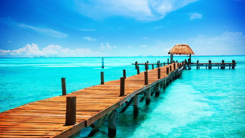 Isla Mujeres is an island where the Gulf of Mexico and the Caribbean Sea meet. It is a slice of paradise a short distance off the coast of Cancun.