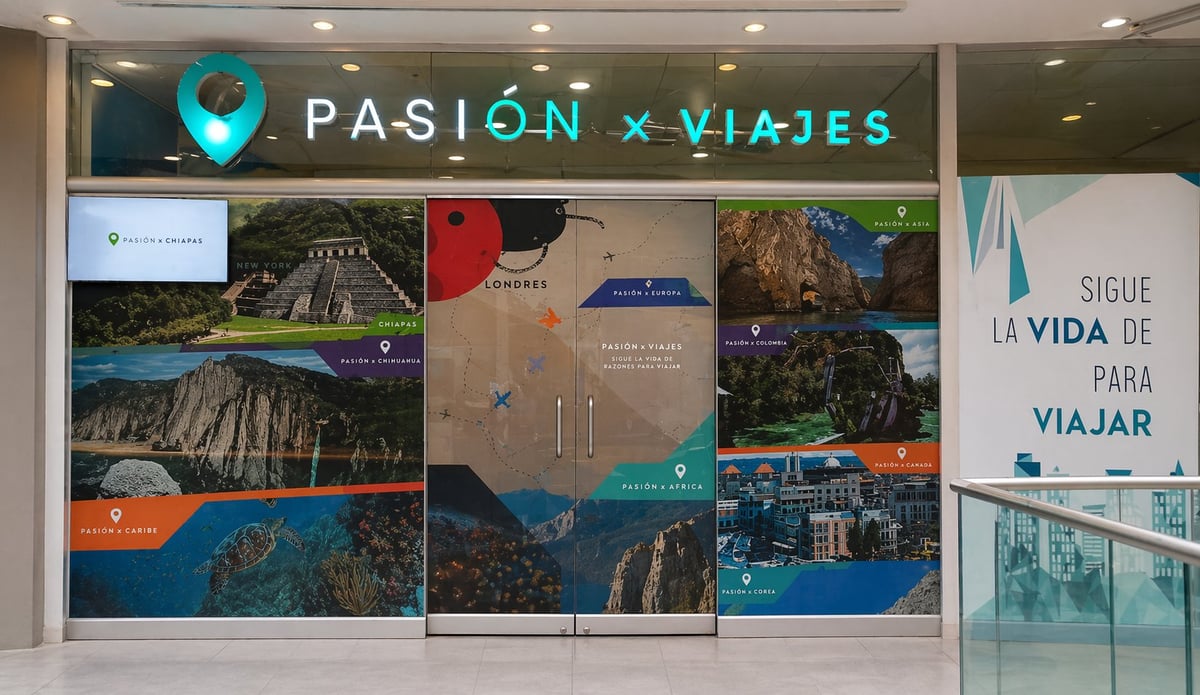 Travel agency storefront with Pasion x Viajes logo, displaying destination photos and Follow Your Passion to Travel signage
